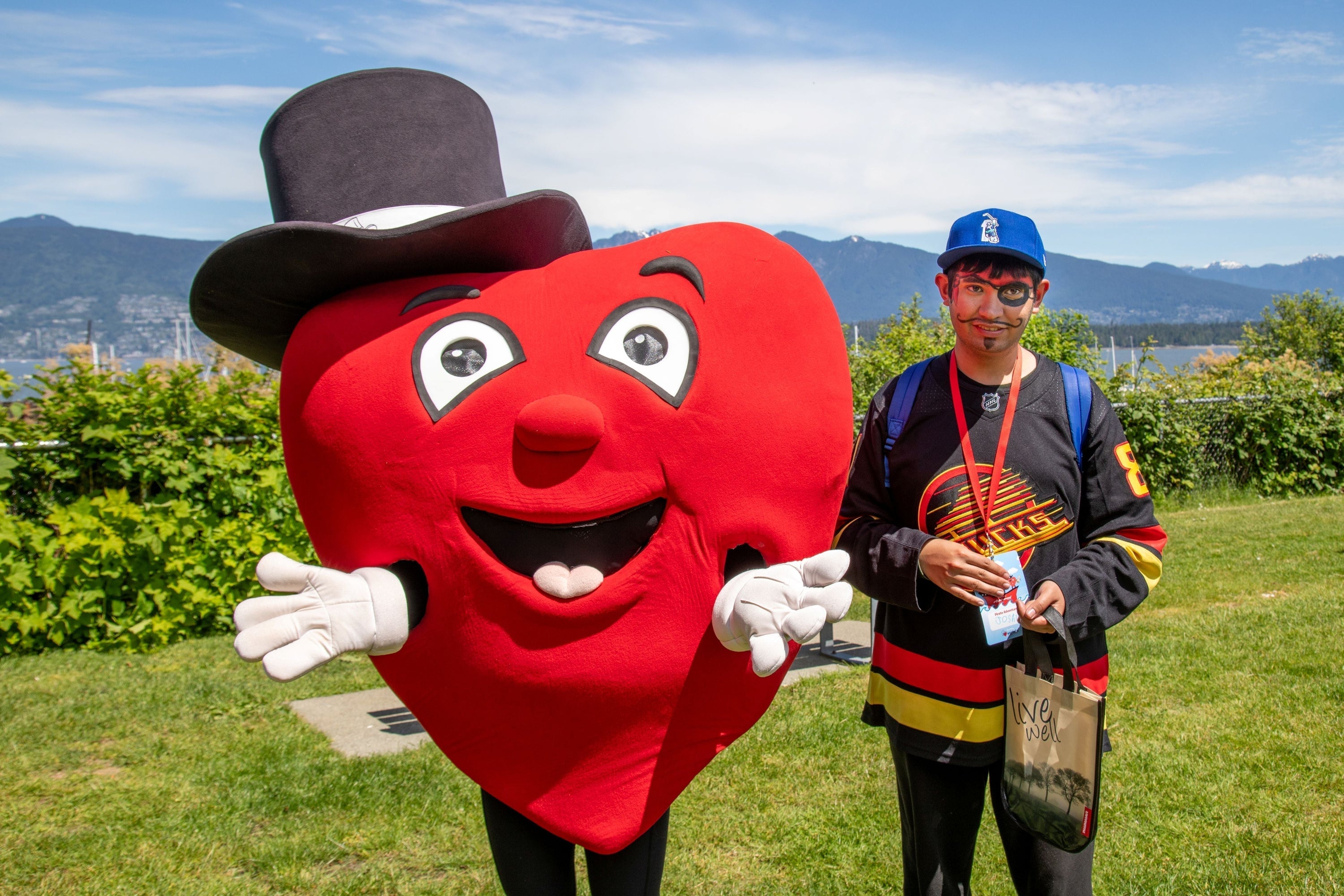 The Variety Children's Charity mascot at Treasure Island during the Boat for Hope event with one of the participants.